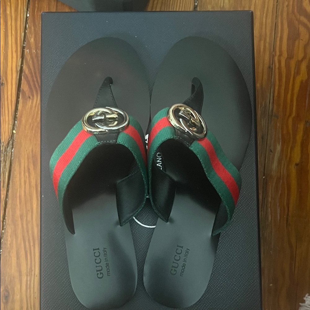 Black and Green Flats with Red Accents